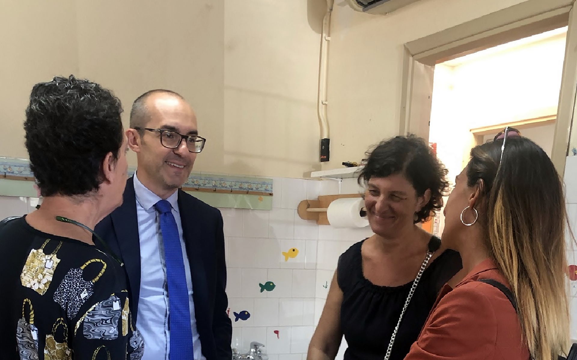 Il sindaco Paolo Truzzu alla riapertura dell'asilo in via Schiavazzi