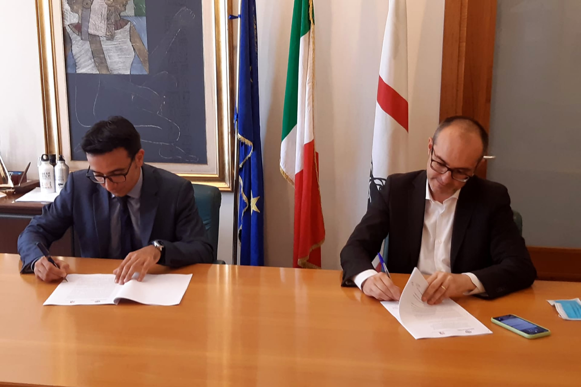 Paolo Truzzu e Gianni Lampis firmano l'accordo sui cambiamenti climatici